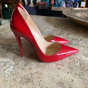 Christian Louboutin red patent stiletto pumps